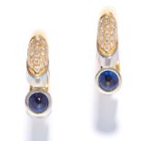 A PAIR OF SAPPHIRE AND DIAMOND HOOP EARRINGS in yellow gold, each set with a cabochon sapphire and