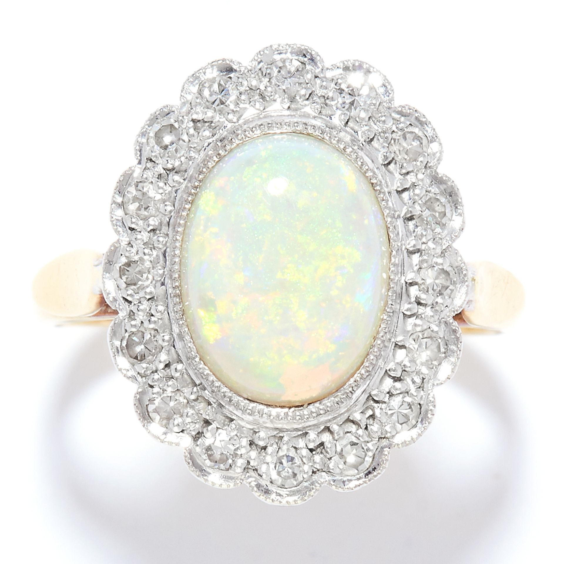 OPAL AND DIAMOND CLUSTER RING in yellow gold, set with a cabochon opal in a cluster of round cut