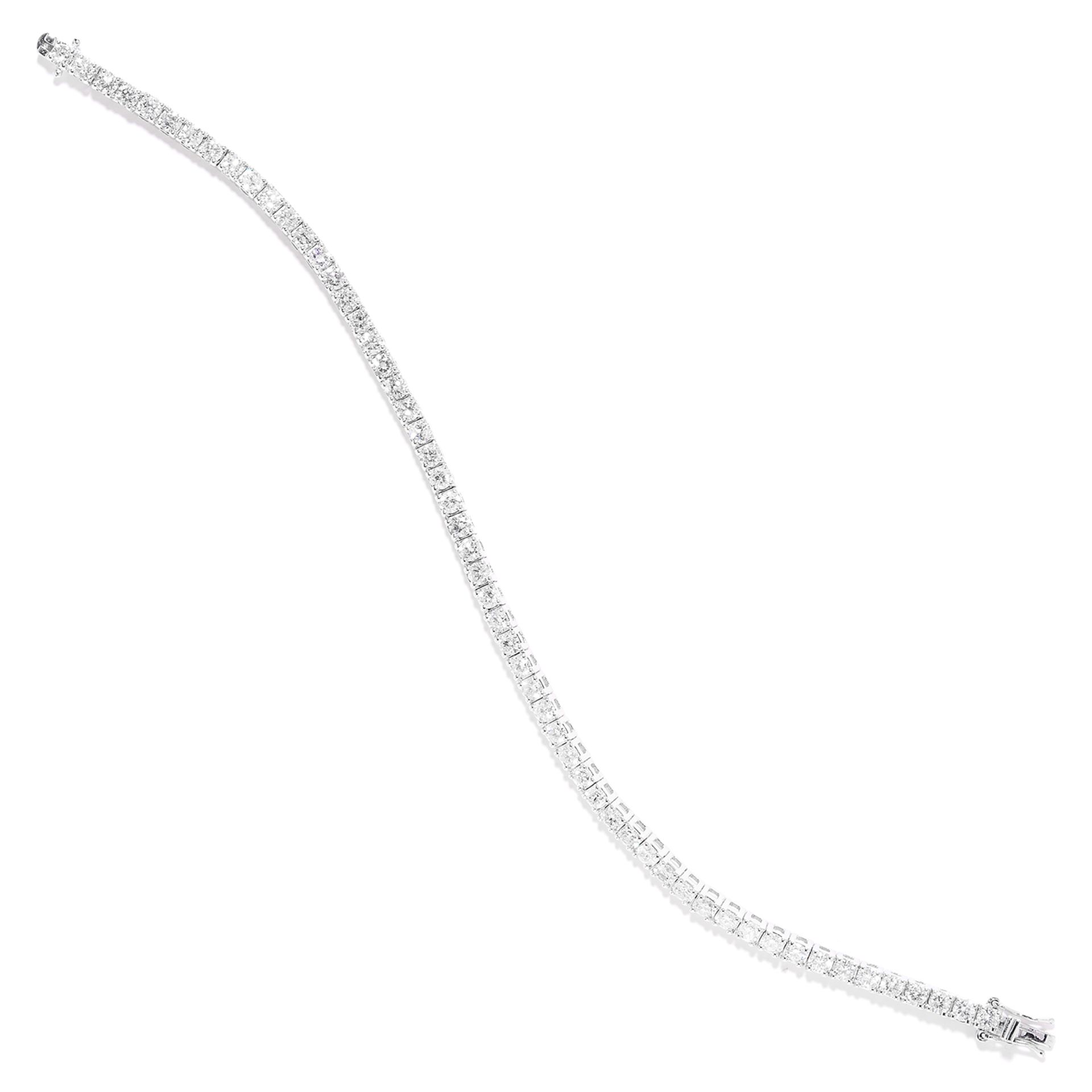 5.60 CART DIAMOND LINE BRACELET in 18ct white gold, comprising a single row of round cut diamonds,