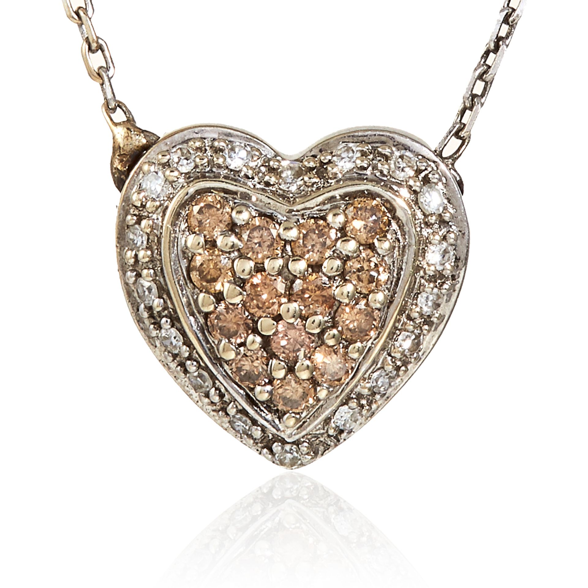 A CHAMPAGNE AND WHITE DIAMOND HEART PENDANT NECKLACE in 18ct white gold, the heart motif jewelled