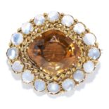 AN ANTIQUE MOONSTONE AND ZIRCON BROOCH in high carat yellow gold, set with a cushion cut zircon