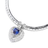 TANZANITE AND DIAMOND PENDANT NECKLACE in 18ct white gold, the fancy link chain suspending a heart