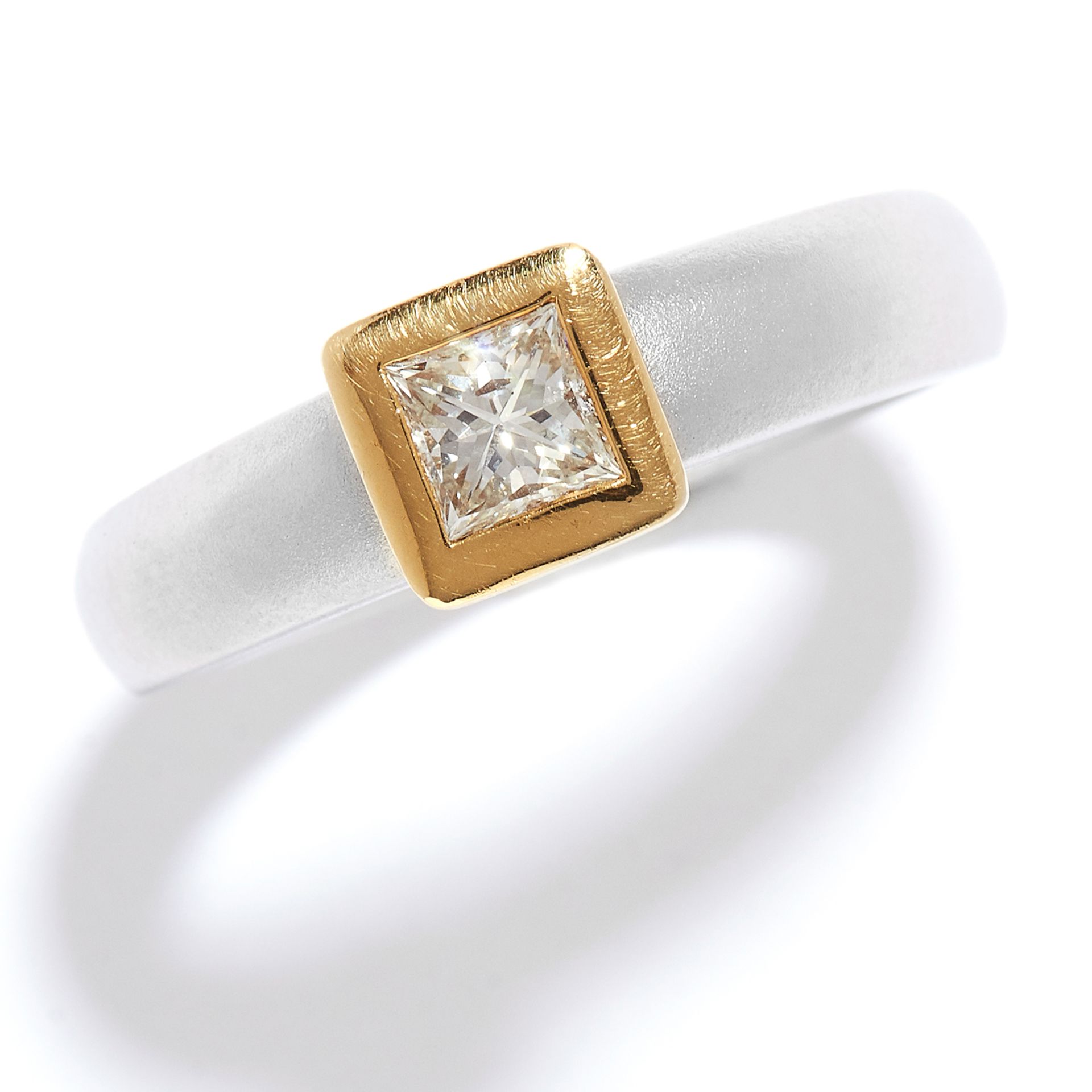 SOLITAIRE DIAMOND ENGAGEMENT RING in 18ct yellow gold and platinum, the princess cut diamond in a