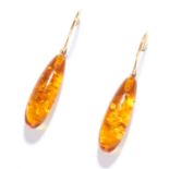 AMBER DROP EARRINGS in high carat yellow gold, each polished amber drop suspended from a gold