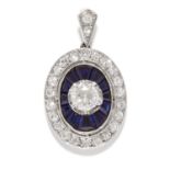 DIAMOND AND SAPPHIRE PENDANT in platinum, the central round cut diamond of 0.50 carats within