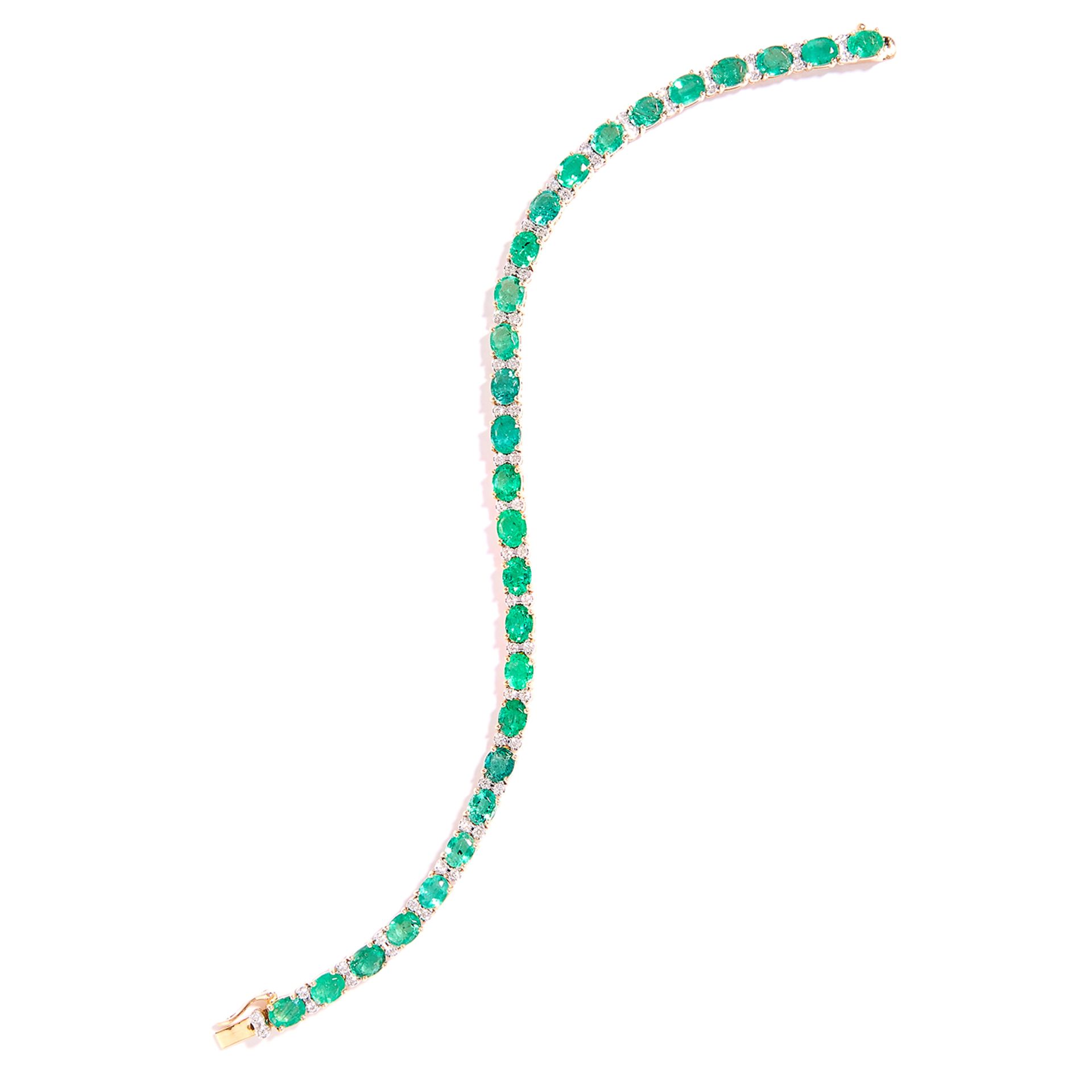 EMERALD AND DIAMOND LINE BRACELET in 18ct yellow gold, set with oval cut emeralds totalling
