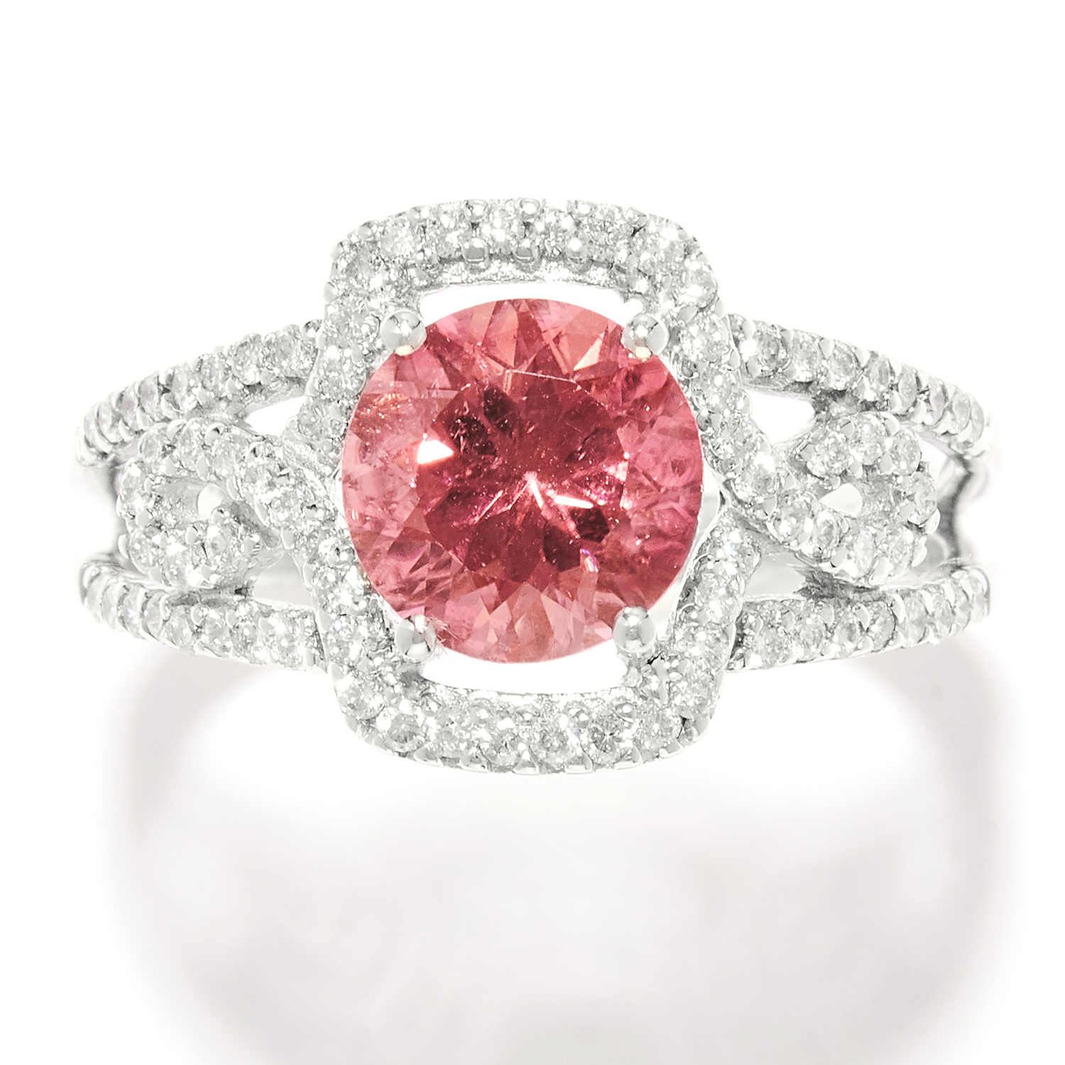 TOURMALINE AND DIAMOND DRESS RING in white gold, set with a round cut pink tourmaline and round