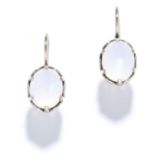 A PAIR OF MOONSTONE EARRINGS in 14ct white gold, each set with a cabochon moonstone, stamped 14K,