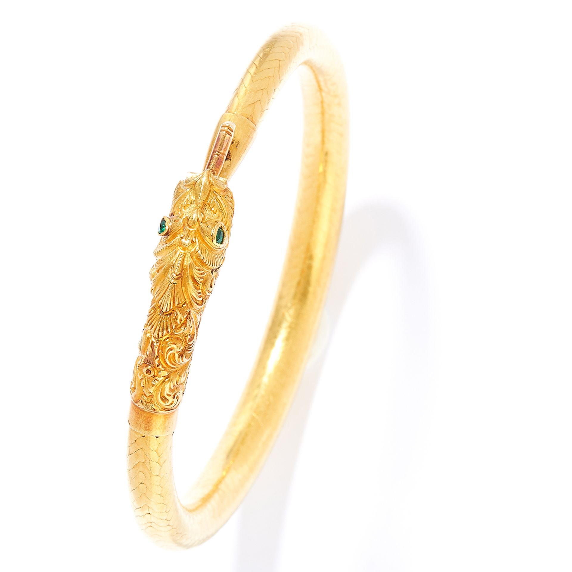 ANTIQUE CHINESE EMERALD DRAGON BANGLE, 19TH CENTURY in high carat yellow gold, with round cut