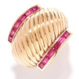 RUBY DRESS RING, FRENCH, CIRCA 1940 in 18ct yellow gold, comprising of a textured gold design
