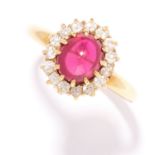ANTIQUE RUBY AND DIAMOND RING, EARLY 20TH CENTURY in 18ct yellow gold, comprising of a cabochon ruby
