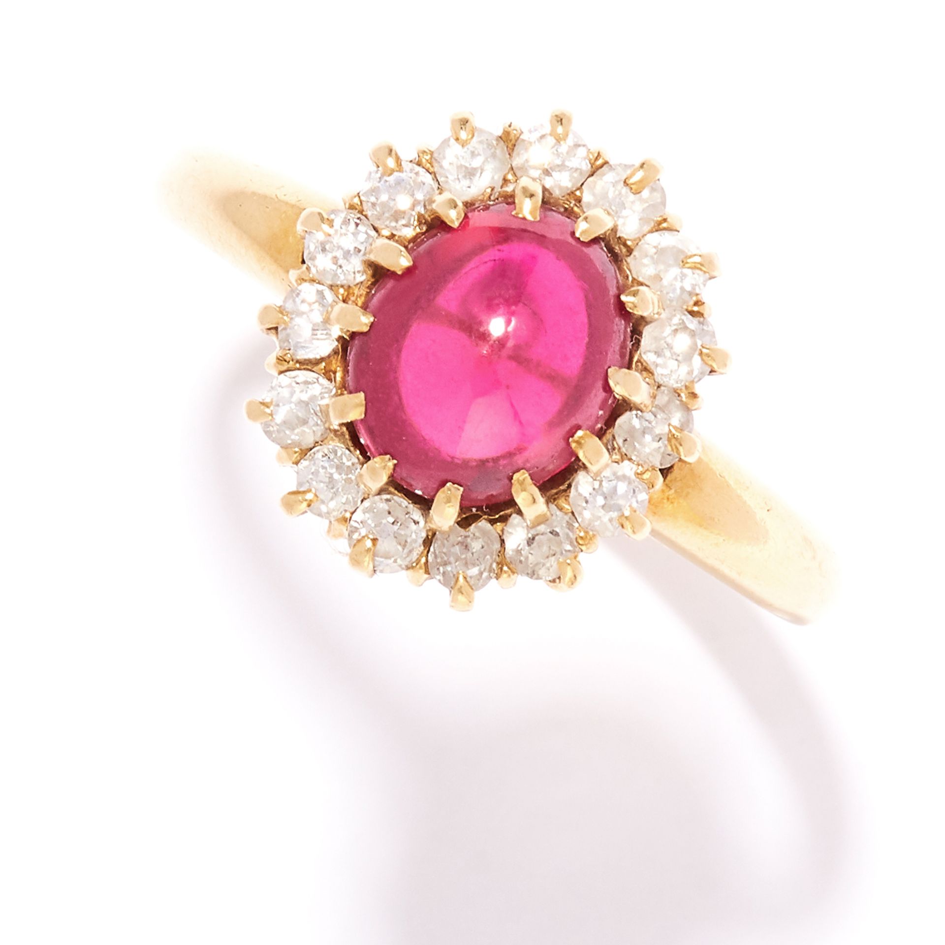 ANTIQUE RUBY AND DIAMOND RING, EARLY 20TH CENTURY in 18ct yellow gold, comprising of a cabochon ruby