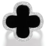 ONYX AND DIAMOND RING in 18ct white gold, in the manner of Van Cleef and Arpels alhambra ring, set