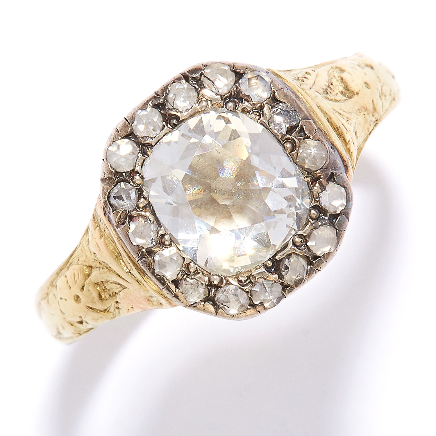 ANTIQUE DIAMOND CLUSTER RING in high carat yellow gold and silver, the old mine cut diamond of