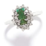 EMERALD AND DIAMOND CLUSTER RING in 18ct white gold, set with an emerald cut emerald in a border