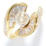 0.90 CARAT DIAMOND DRESS RING in 18ct yellow gold, the twisted shank is set with a principle diamond