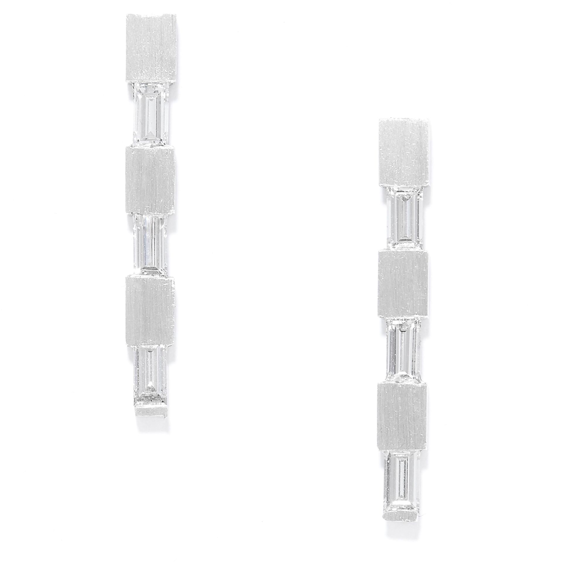 DIAMOND EARRINGS in 18ct white gold or platinum, each set with alternating gold blocks and emerald