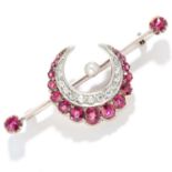 ANTIQUE RUBY AND DIAMOND BROOCH in yellow gold, designed as a crescent moon set