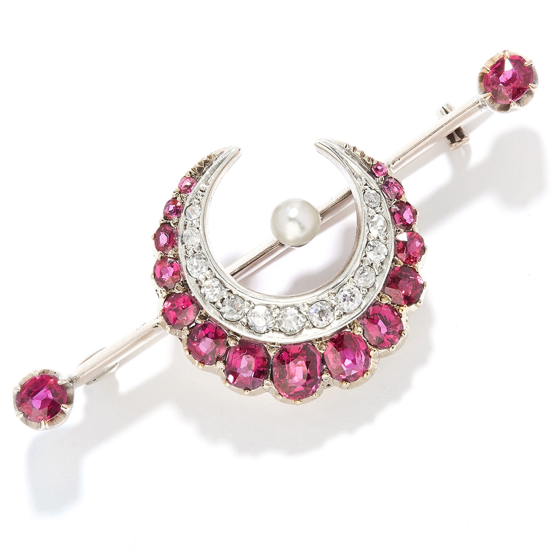 ANTIQUE RUBY AND DIAMOND BROOCH in yellow gold, designed as a crescent moon set