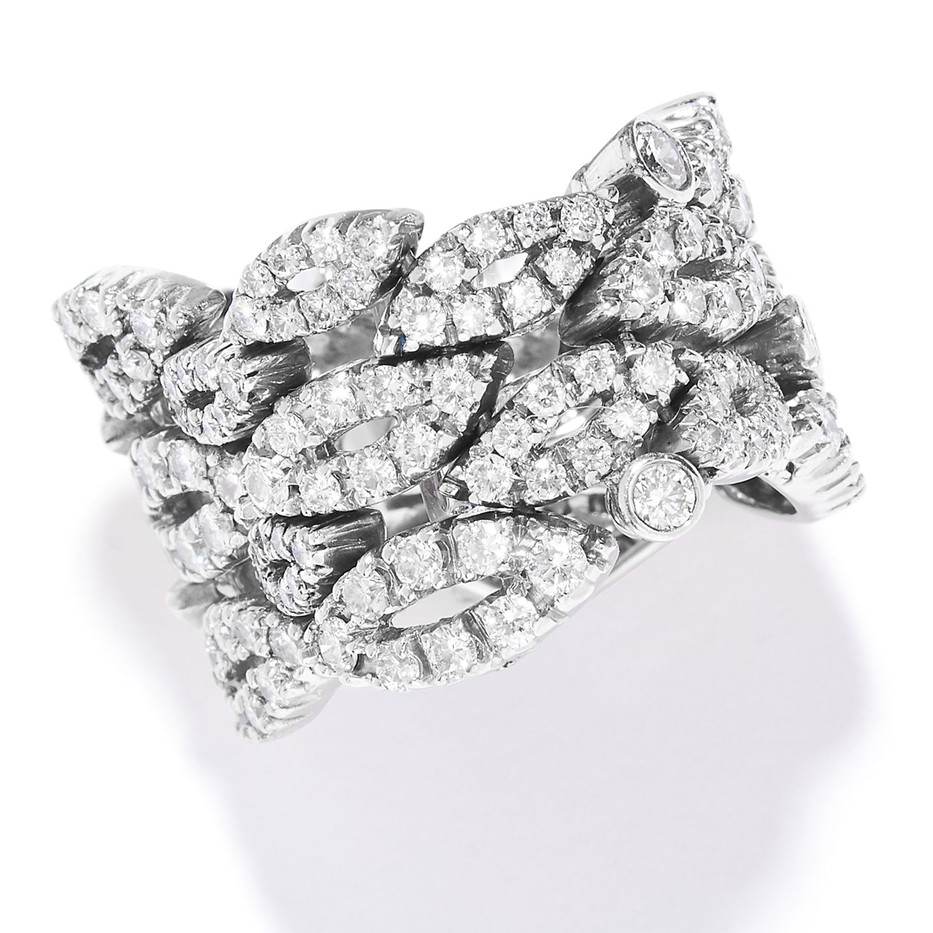 DIAMOND DRESS RING in white gold or platinum, in articulated design, set with round cut diamonds,
