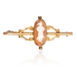 AN ANTIQUE CAMEO BAR BROOCH in yellow gold, set with cameo on bar brooch, stamped 9ct, 4.5cm, 2.