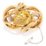 ANTIQUE CITRINE BROOCH, VICTORIAN in high carat yellow gold, set with an oval cut citrine in twisted