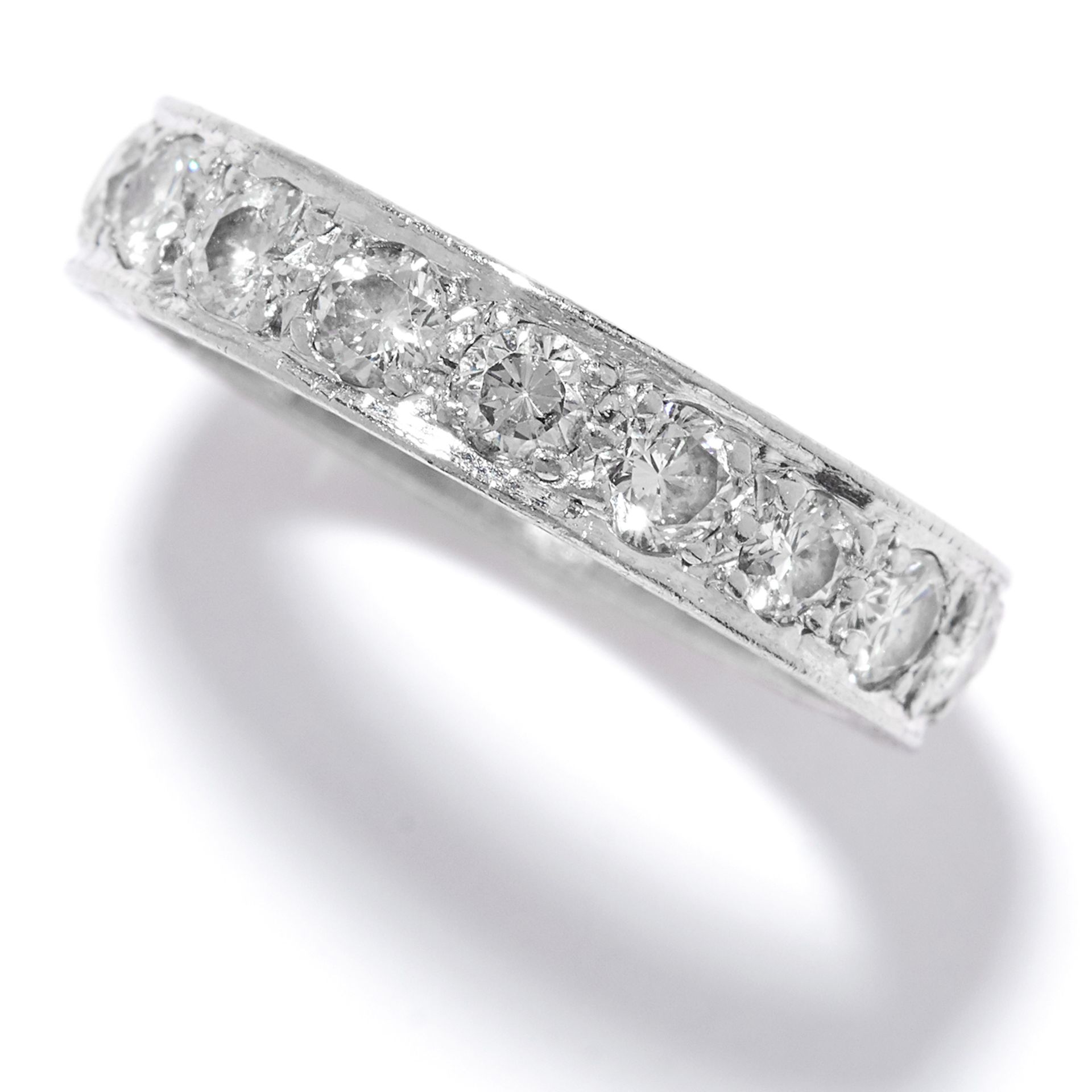 A 1.50 CARAT DIAMOND ETERNITY RING in platinum or white gold, set with a single row of round cut