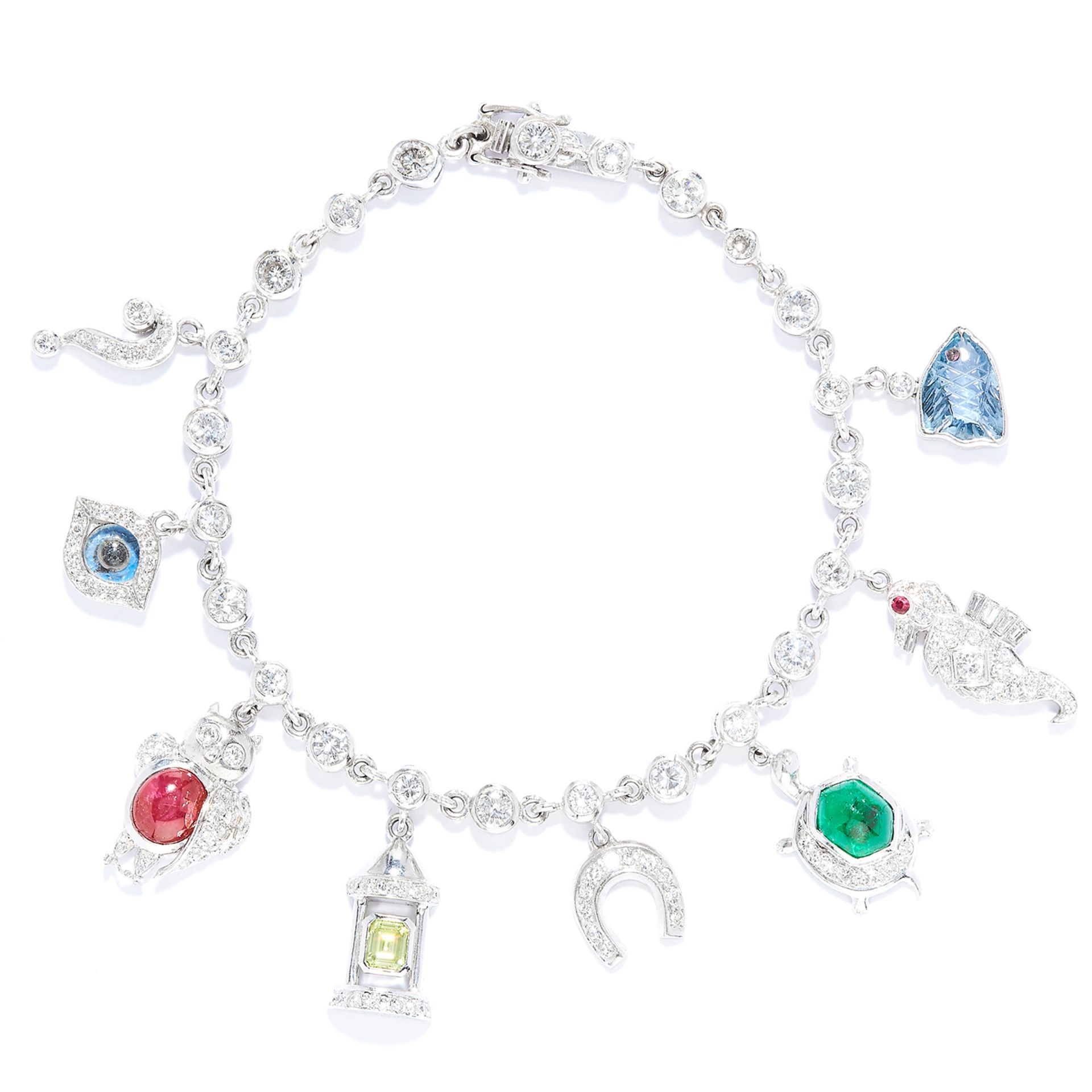 YELLOW DIAMOND, RUBY, EMERALD AND AQUAMARINE CHARM BRACELET, ADLER in 18ct white gold, comprising