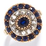 ANTIQUE SAPPHIRE AND DIAMOND RING in yellow gold, set with an oval cut sapphire in a border of