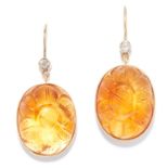 MUGHAL CARVED CITRINE AND DIAMOND EARRINGS in yellow gold, each comprising of a round cut diamond