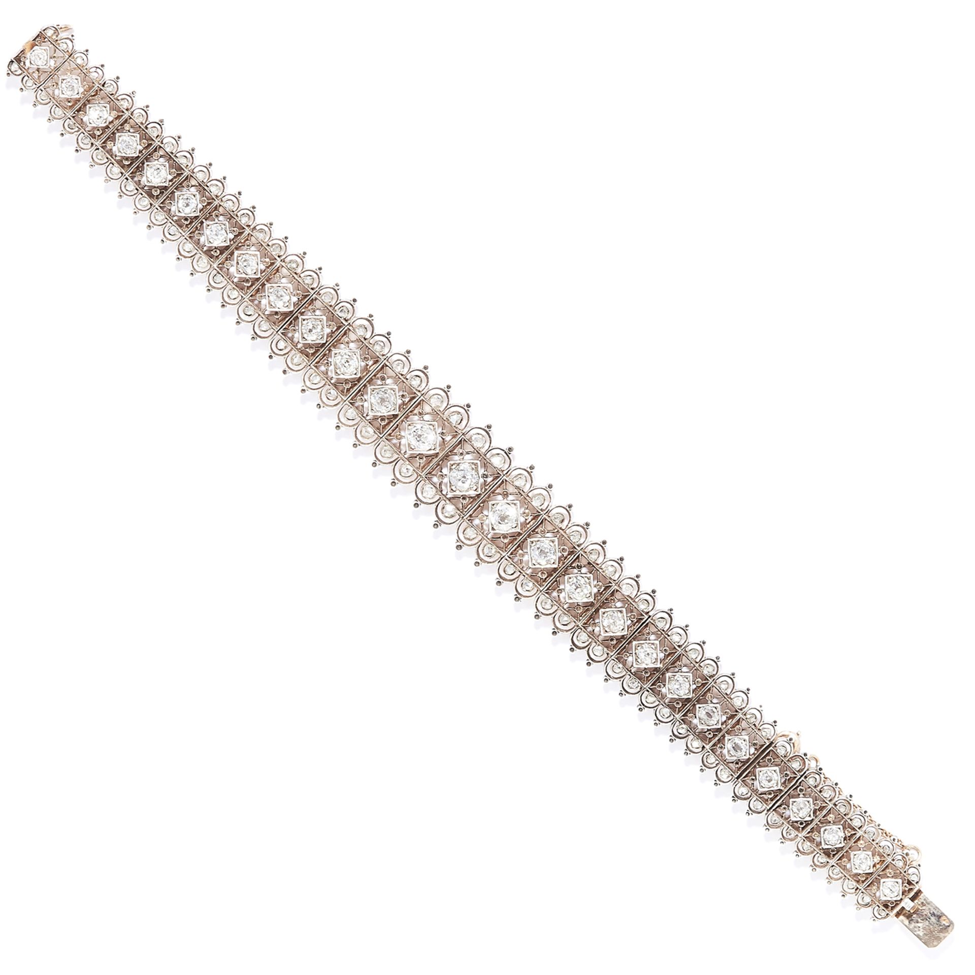 ANTIQUE DIAMOND BRACELET in high carat yellow gold, set with a row of old cut diamonds in detailed