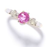 PINK SAPPHIRE AND DIAMOND THREE STONE RING in 18ct yellow gold, set with a round cut pink sapphire