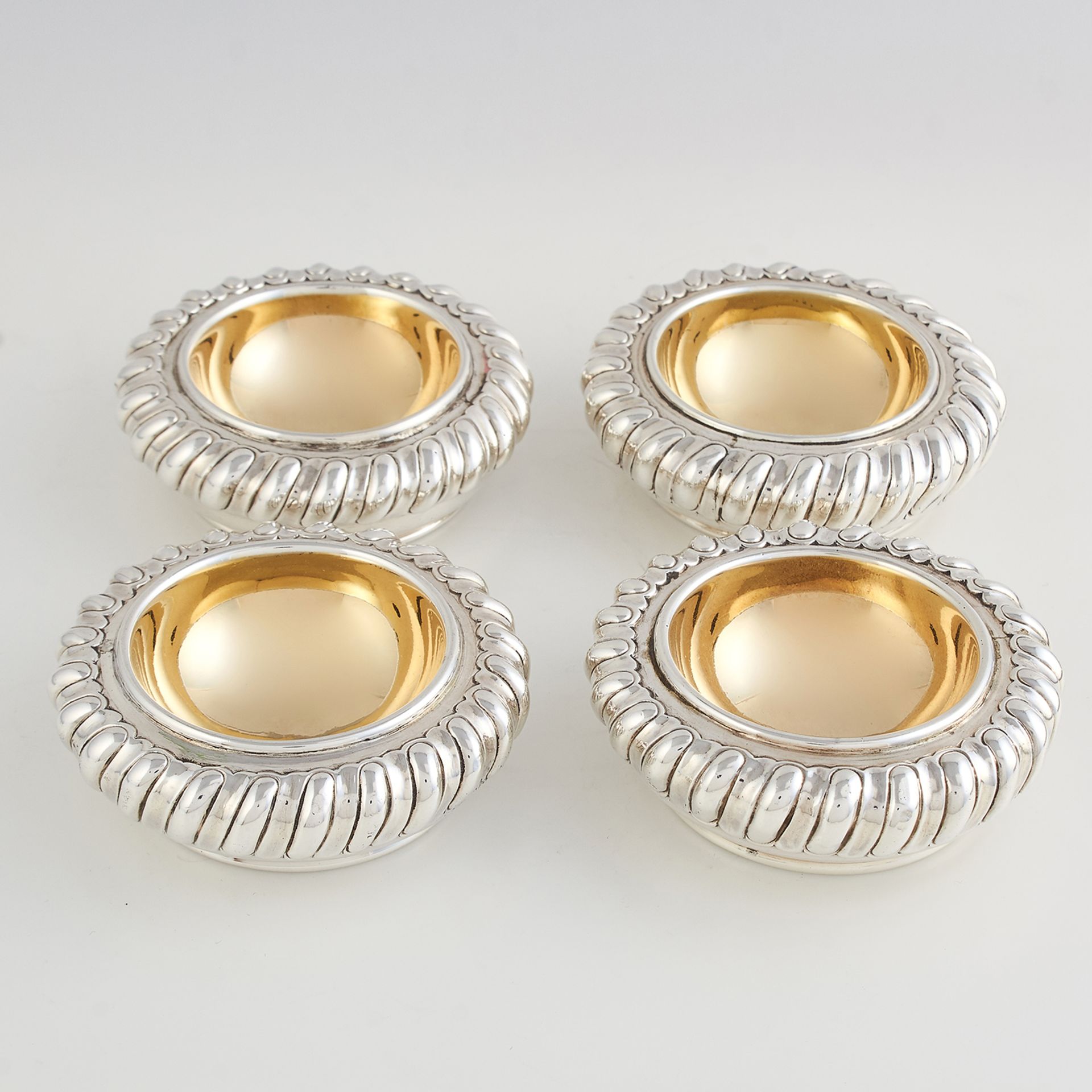 SET OF FOUR ANTIQUE GEORGE IV STERLING SILVER SALT CELLARS, JOSEPH ANGELL LONDON 1824 of circular