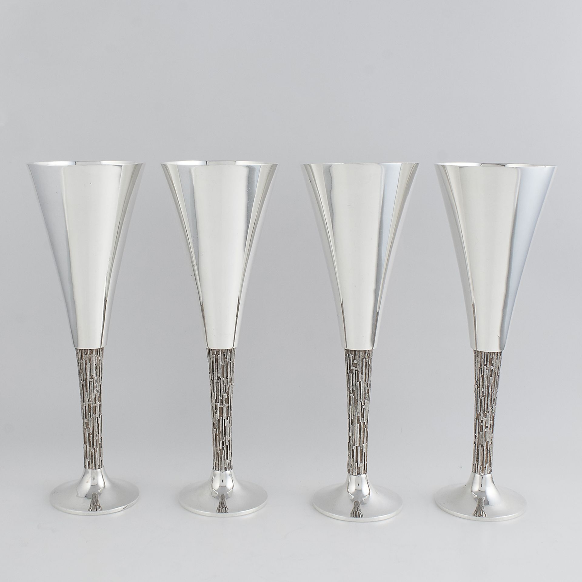 SET OF FOUR STERLING SILVER GOBLETS / CHAMPAGNE FLUTES, CHRISTOPHER LAWRENCE LONDON 1971 the