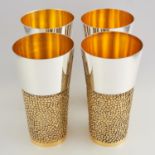 SET OF FOUR STERLING SILVER GILT BEAKERS, CHRISTOPHER LAWRENCE LONDON 1969 each of tapering form,