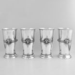 FOUR ANTIQUE STERLING SILVER BEAKERS / CUPS, D & J WELLBY, LONDON 1910 the tapering bodies with