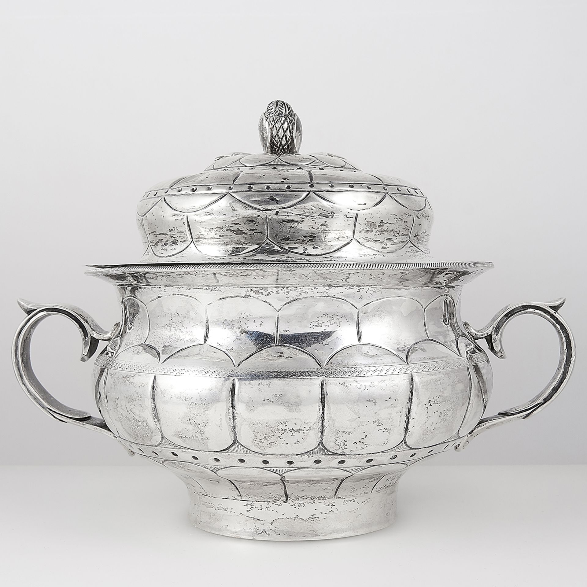 ANTIQUE MEXICAN SILVER POT AND COVER, 19TH CENTURY circular baluster form with chased decoration,