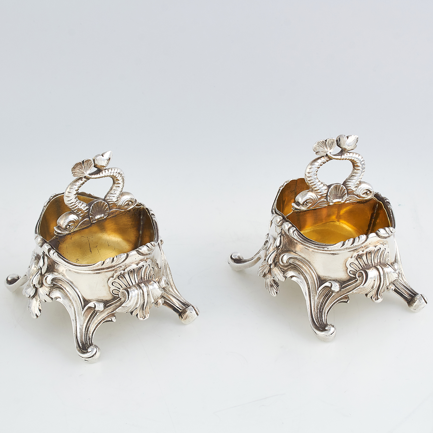 PAIR OF ANTIQUE FRENCH SILVER SALT CELLARS, F DUNARD CIRCA 1870 of oval form, each raised on four
