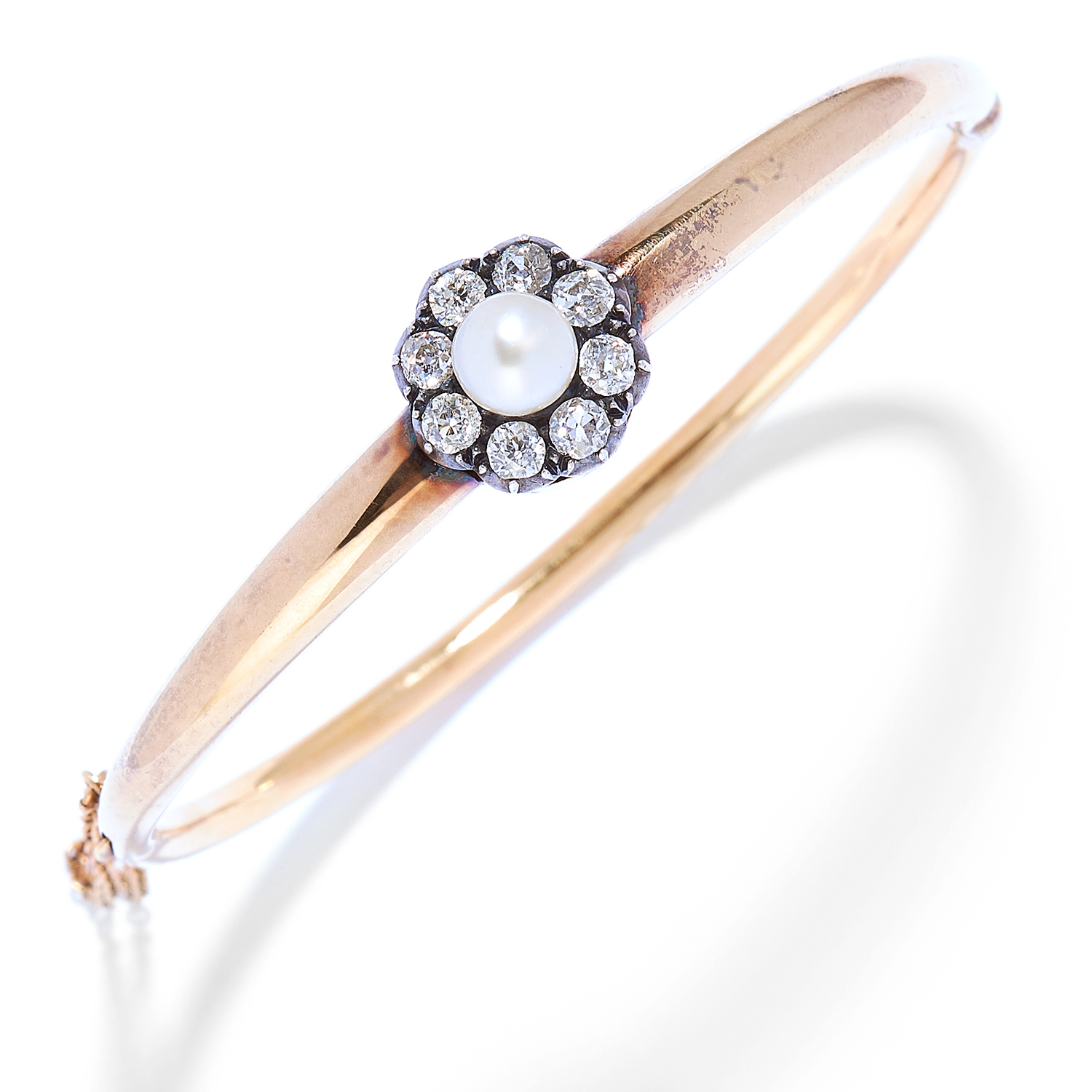 ANTIQUE DIAMOND AND PEARL BANGLE in yellow gold, set with a pearl approximately 6.4mm in diameter in