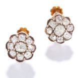 A PAIR OF ANTIQUE DIAMOND CLUSTER EARRINGS in high carat yellow gold, set with old cut diamonds in