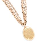 AN ANTIQUE LOCKET AND CHAIN comprising of an oval locket engraved with foliate motif, on fancy