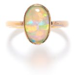 OPAL DRESS RING in 18ct yellow gold, set with a cabochon harlequin black opal, marked indistinctly