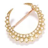 ANTIQUE PEARL CRESCENT MOON BROOCH in high carat yellow gold, set with seed pearls, unmarked, 2.3cm,