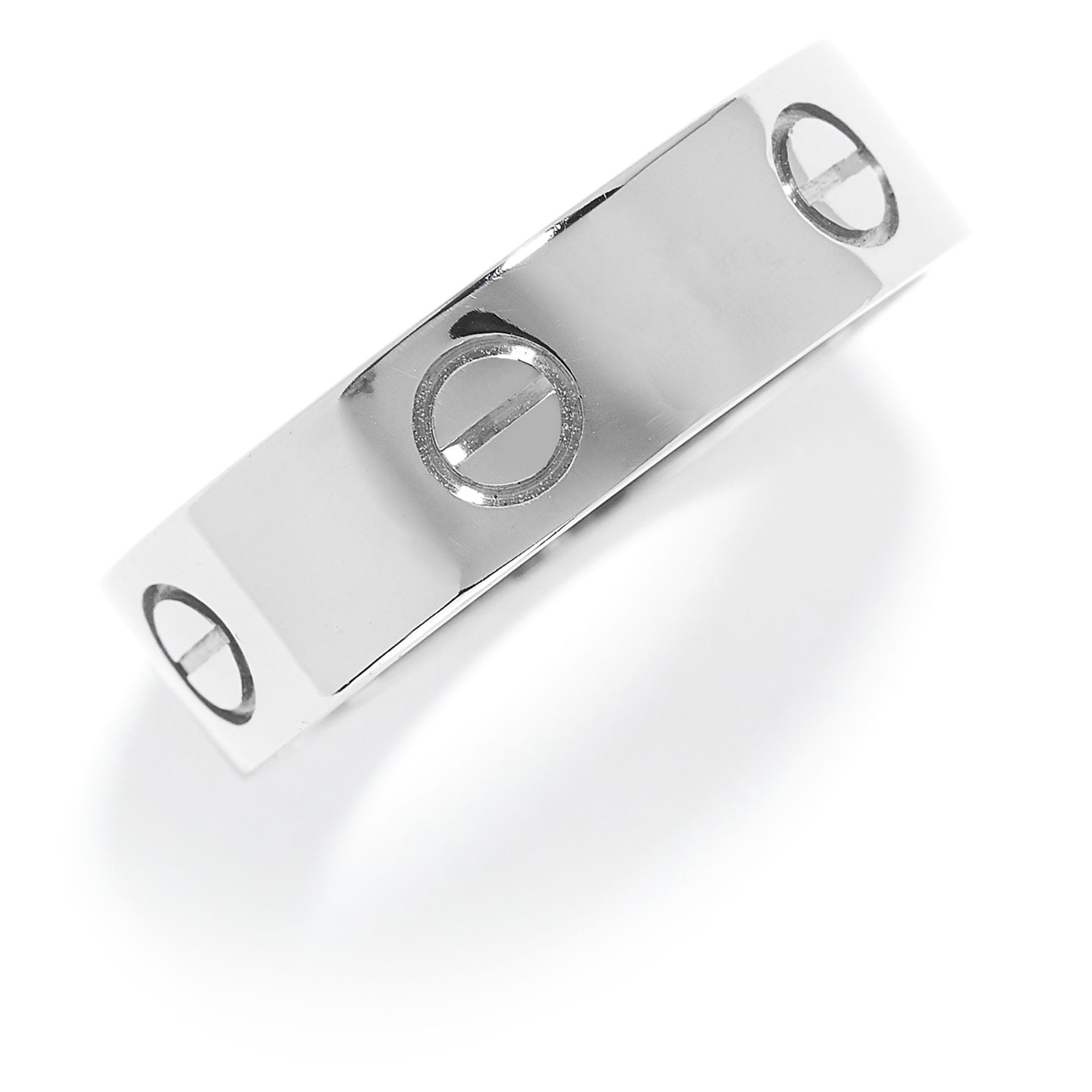 LOVE RING, CARTIER in 18ct white gold, the band with screw head motifs, signed Cartier and numbered,