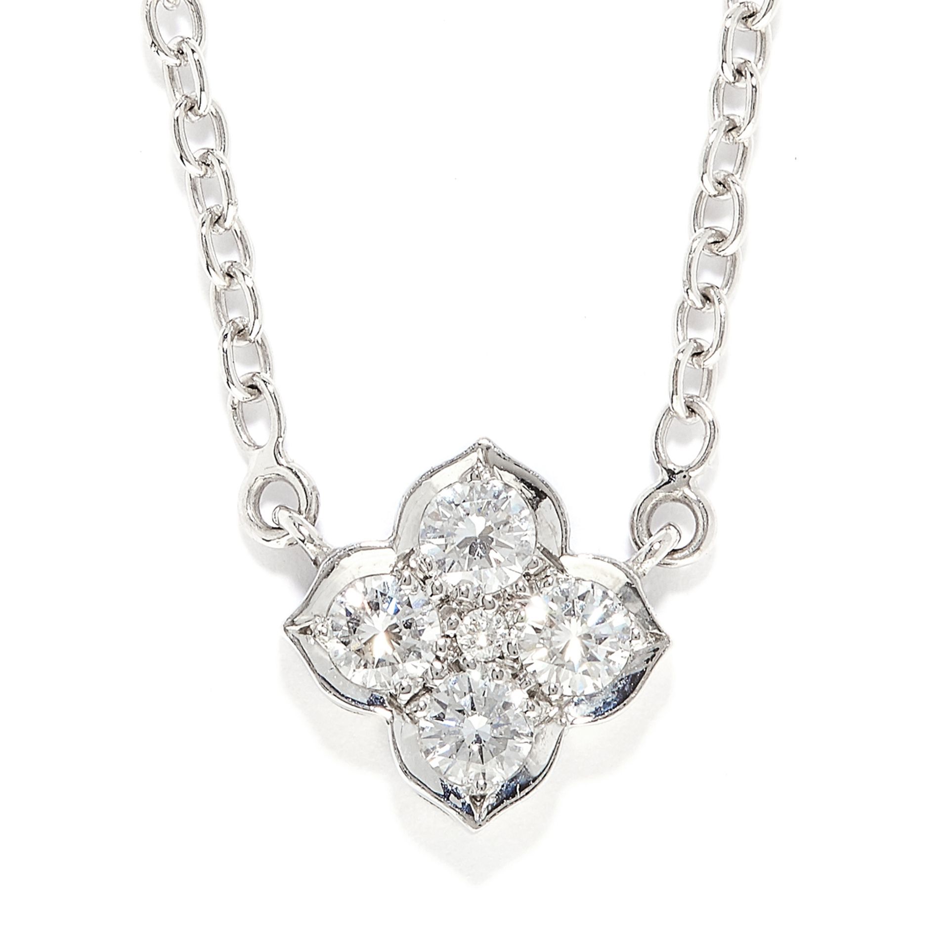 HINDU DIAMOND PENDANT, CARTIER in 18ct white gold, the quatrefoil motif set with round cut