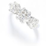 3.25 CARAT DIAMOND THREE STONE RING in platinum or white gold, set with a trio of old round cut
