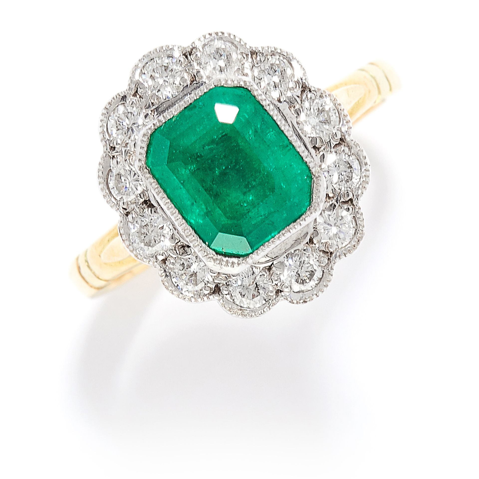 1.56 CARAT EMERALD AND DIAMOND CLUSTER RING in 18ct yellow gold, set with an emerald cut emerald