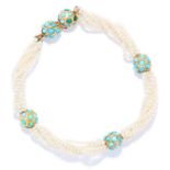 TURQUOISE AND SEED PEARL BRACELET in yellow gold, comprising of strands of seed pearls with cabochon