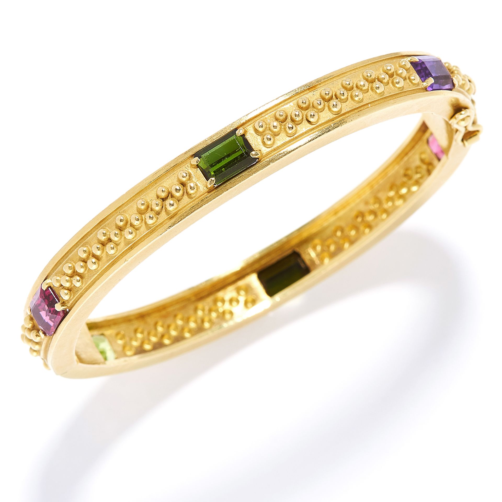 VINTAGE GEM SET BANGLE, VAHE NALTCHAYAN, 1986 in 18ct yellow gold, set with emerald cut