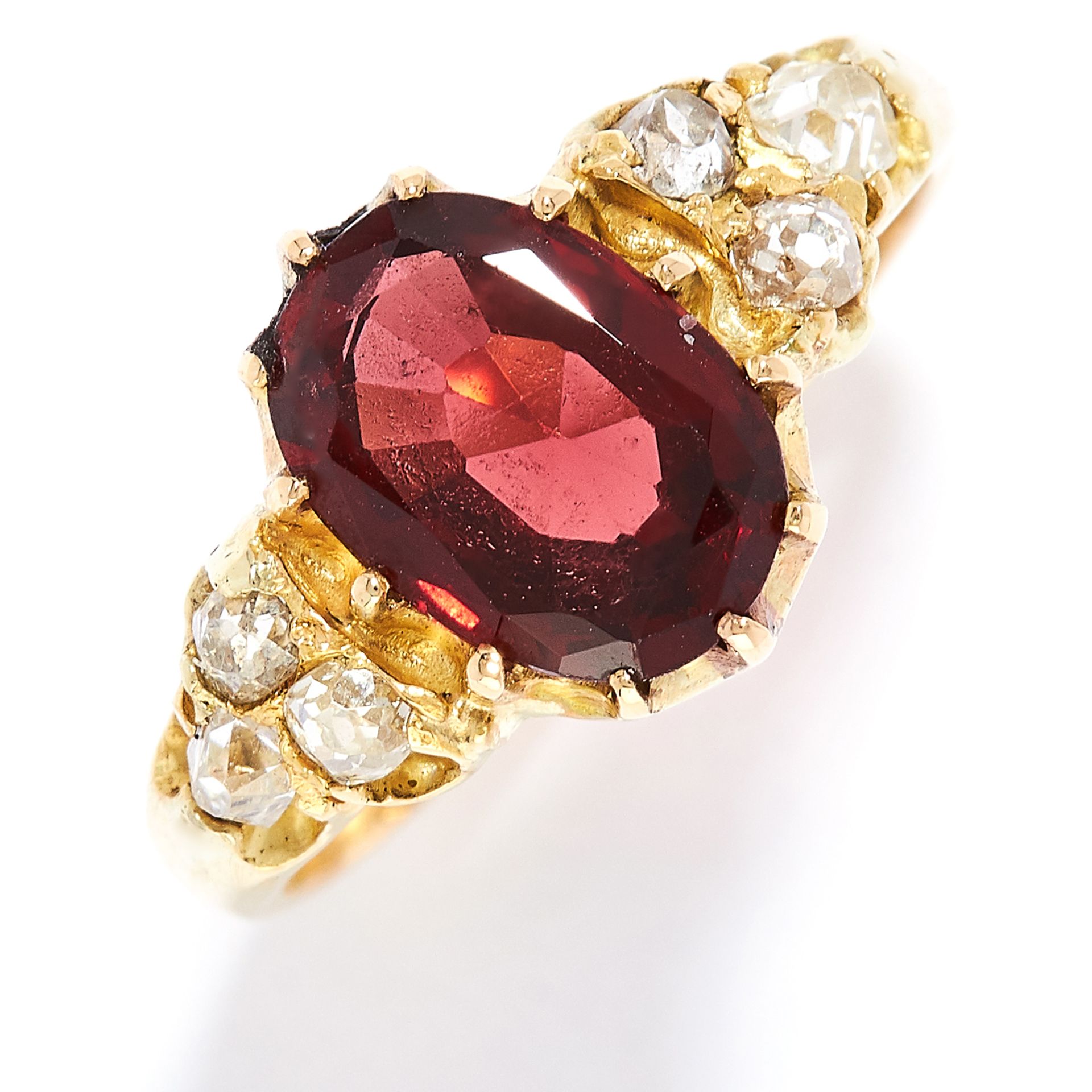 ALMANDINE GARNET AND DIAMOND RING in yellow gold, set with an oval cut almandine garnet of